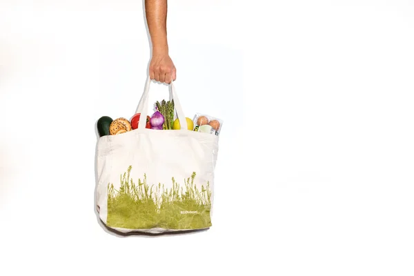 Closeup Of Reusable Grocery Bag Filled With Fresh Produce Stock