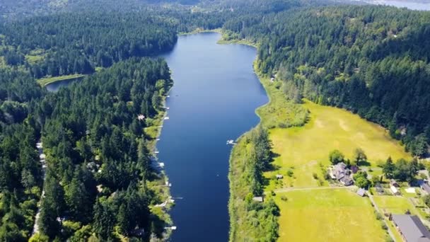 Fly Mirror Lake Reflecting Blue Clear Sky Small Houses Hiding — Stock Video