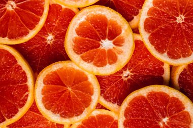 Greyfurt dilimlerinin arkaplanı. Yakın plan.