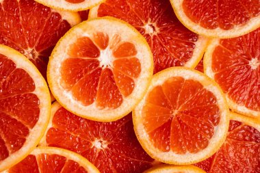 Greyfurt dilimlerinin arkaplanı. Yakın plan.