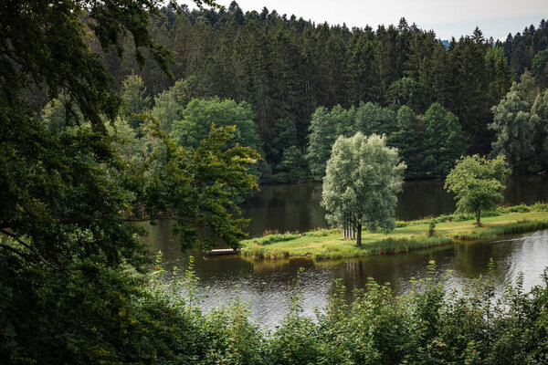 peaceful lake Rannasee in the bavarian forest on the border between austria and germany