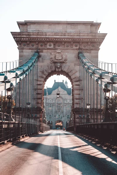 Empty Chain Bridge in Budapest is a historical architecture, famous for tourism, without any transport, with a kings emblem, national monument of Hungary