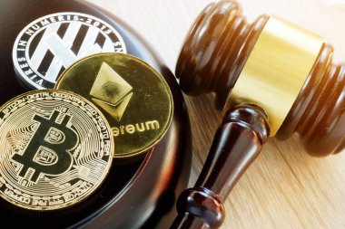 Gavel and cryptocurrency. Government regulation concept. clipart