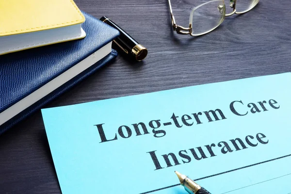 Long Term Care Insurance Policy Table — Stock Photo, Image