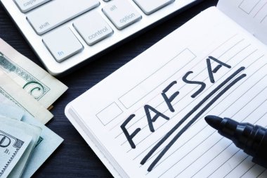 FAFSA handwritten in a note. Free Application for Federal Student Aid. clipart