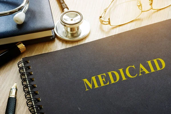 Concepto Medicaid Documentos Pluma Estetoscopio — Foto de Stock