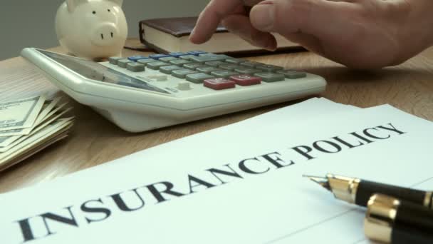 Agent Calculating Cost Insurance Policy — Stock Video