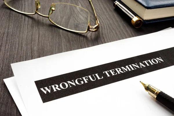 Documents Wrongful Termination Wooden Desk — Stock Photo, Image