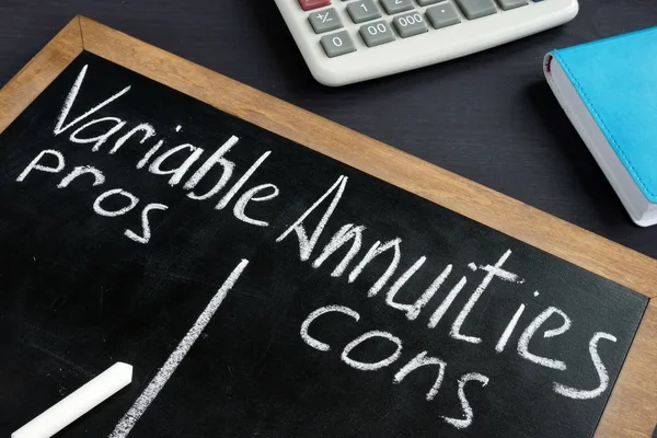 Variable Annuities pros and cons written on a blackboard.