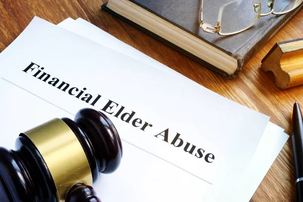 Financial Elder Abuse report and gavel in a court. — Stock Photo, Image