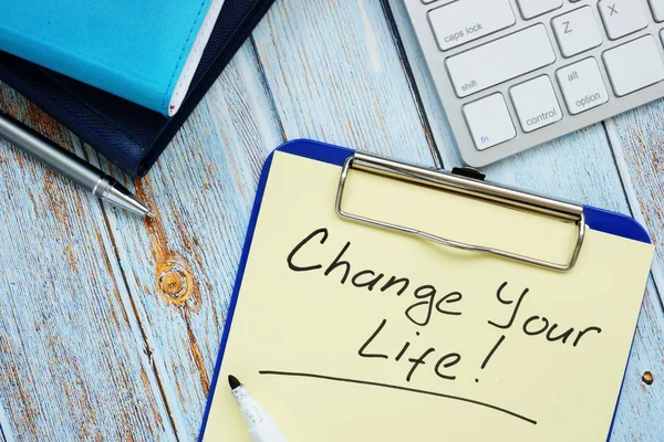 Change your life- motivation quote handwritten on a piece of paper. — Stock Photo, Image