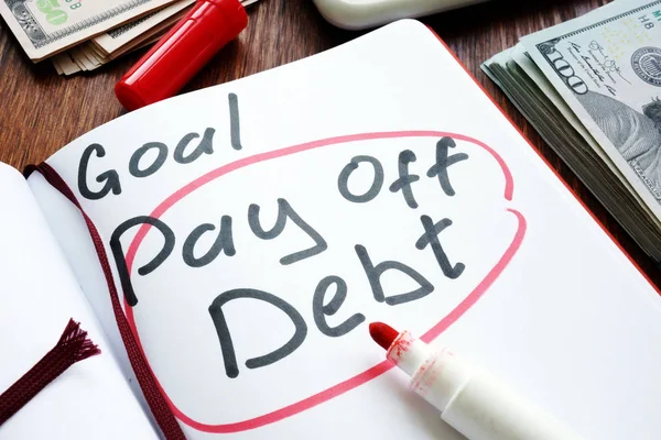 Handwritten goal pay off debt on a page. — Stock Photo, Image