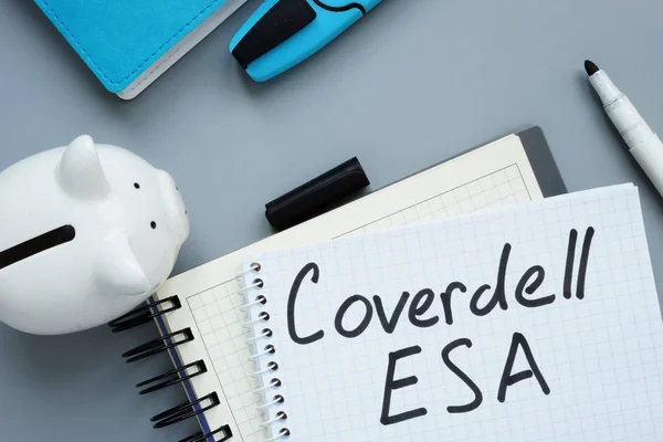 Coverdell ESA Education Saving Account. Note pad and piggy bank. — Stock Photo, Image