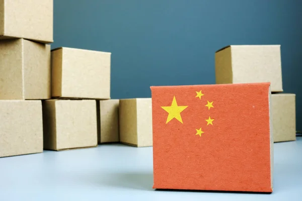 Made in China. Cardboard box with chinese flag.