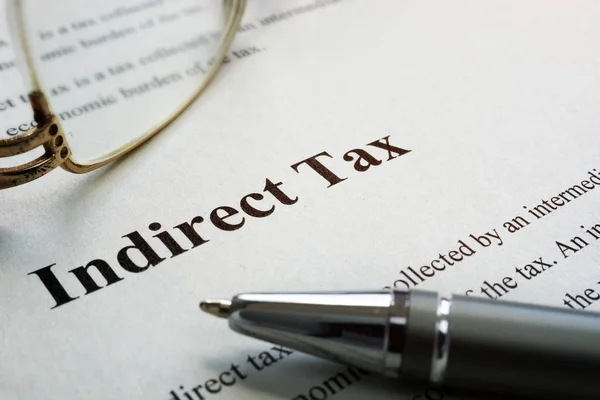 Paper with sign Indirect tax and eyeglases. — Stock Photo, Image