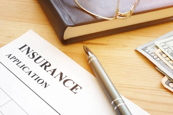 Insurance application form and pen for signing. — Stock Photo, Image