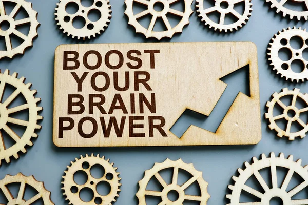 Boost Your Brain Power teken op houten plaat. — Stockfoto