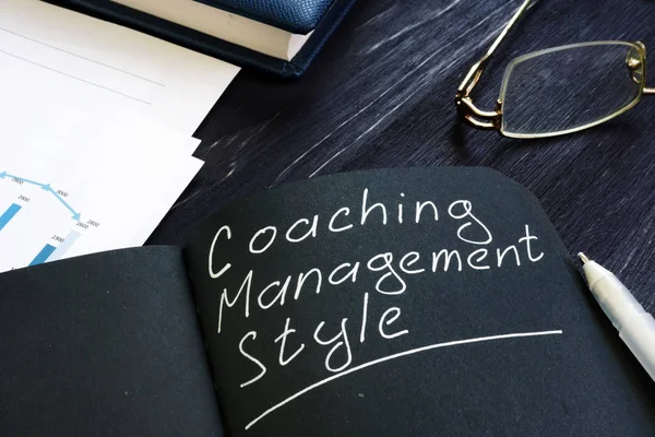 Coaching Management Style handwritten inscription and glasses.