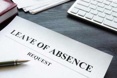 Leave of absence request on the table. clipart