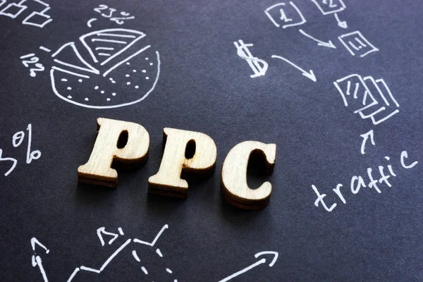 Ppc betalen per klik teken op zwart papier. — Stockfoto