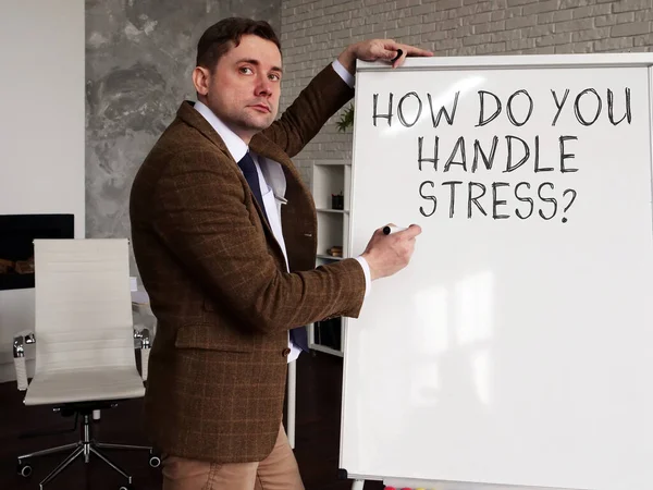 Mentor writes on the whiteboard How Do You Handle Stress.