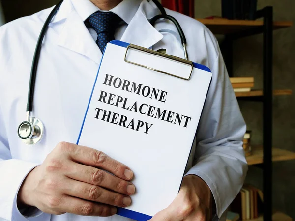 Doctor shows Hormone replacement therapy HRT information. — Stock Photo, Image