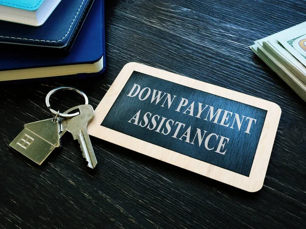Down payment assistance phrase and house key.