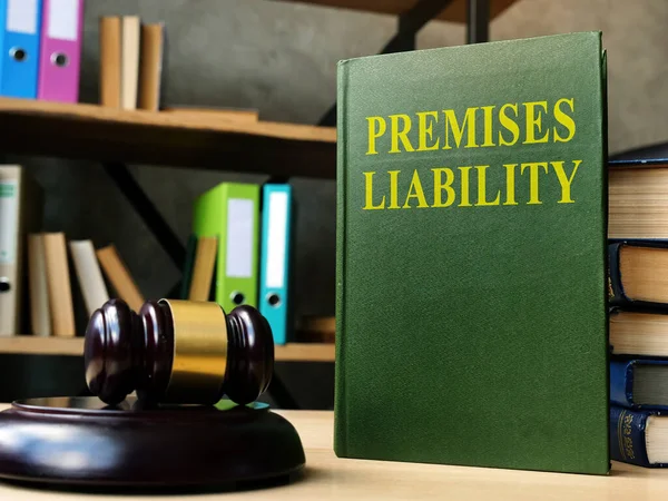 Premises liability laws book for personal injury cases on the shelf. — Stock Photo, Image