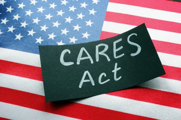 USA bandiera e parola CARES act Il Coronavirus Aid, Relief, and Economic Security Act. — Foto Stock