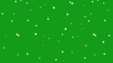 Yeşil ekran arkaplanlı beyaz parçacıklar hareket grafikleri