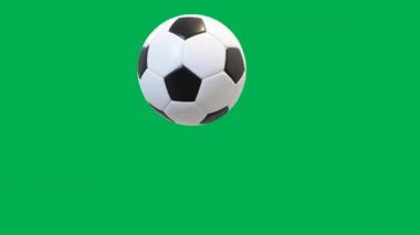 Yeşil ekran arkaplanlı sıçrayan ve dönen futbol