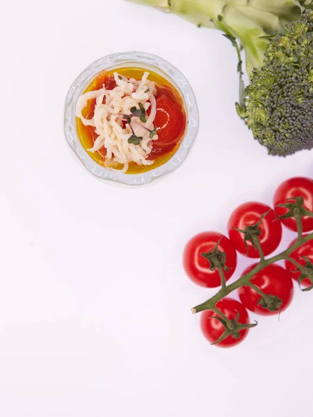 Vegetarian broccoli green soup puree with tomato — Stock Photo, Image