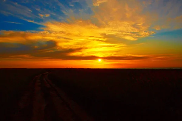 Sunset in the steppe. — Stock Photo, Image