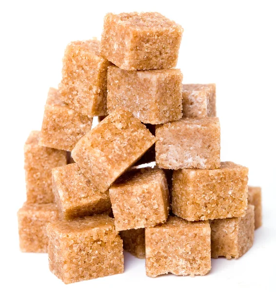 Hnědý Cukr Kostky Bílém Pozadí Mělké Dof — Stock fotografie