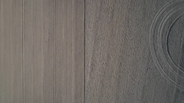 Track of a tractor on a plowed field — Stock Photo, Image