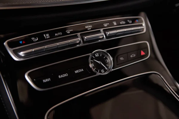 Luxury car interior details. Middle console with air and multimedia controls — Stock Photo, Image