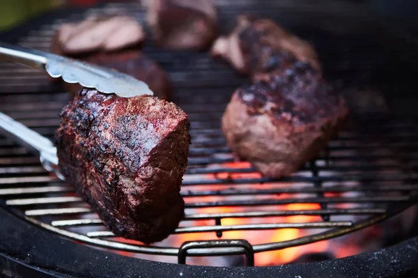Roast beef at barbecue. Low temperature grilling barbecue. — Stock Photo, Image