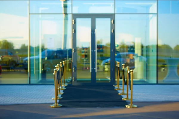 Black carpet between rope barriers. Blur background