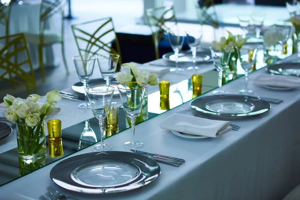 Elegance table set up with lotus flowers, selective focus. — Stock Photo, Image