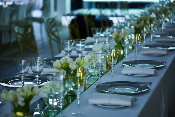 Elegance table set up with lotus flowers, selective focus. — Stock Photo, Image