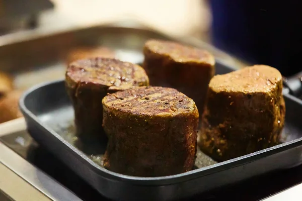 The beef steak in a frying pan. Shallow dof — Stock Photo, Image