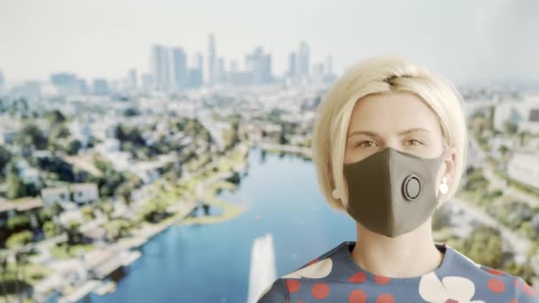Woman in safe mask at home pretending to be in the travel. Posing on background TV screen. 2020 summer quarantine travel. Stay home and social distance — Stock Video
