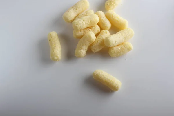 corn sticks on white background