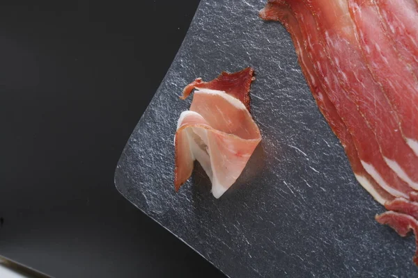 Prosciutto Jamon Sten Bakgrund — Stockfoto