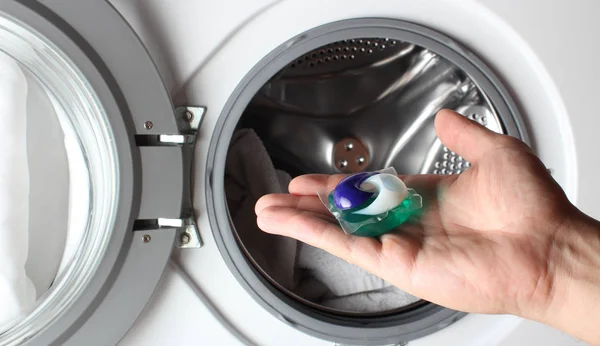 detergent capsule washing machine hand