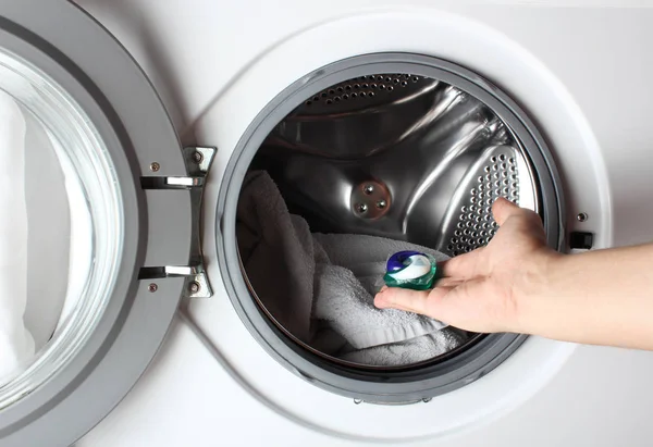 detergent capsule washing machine hand