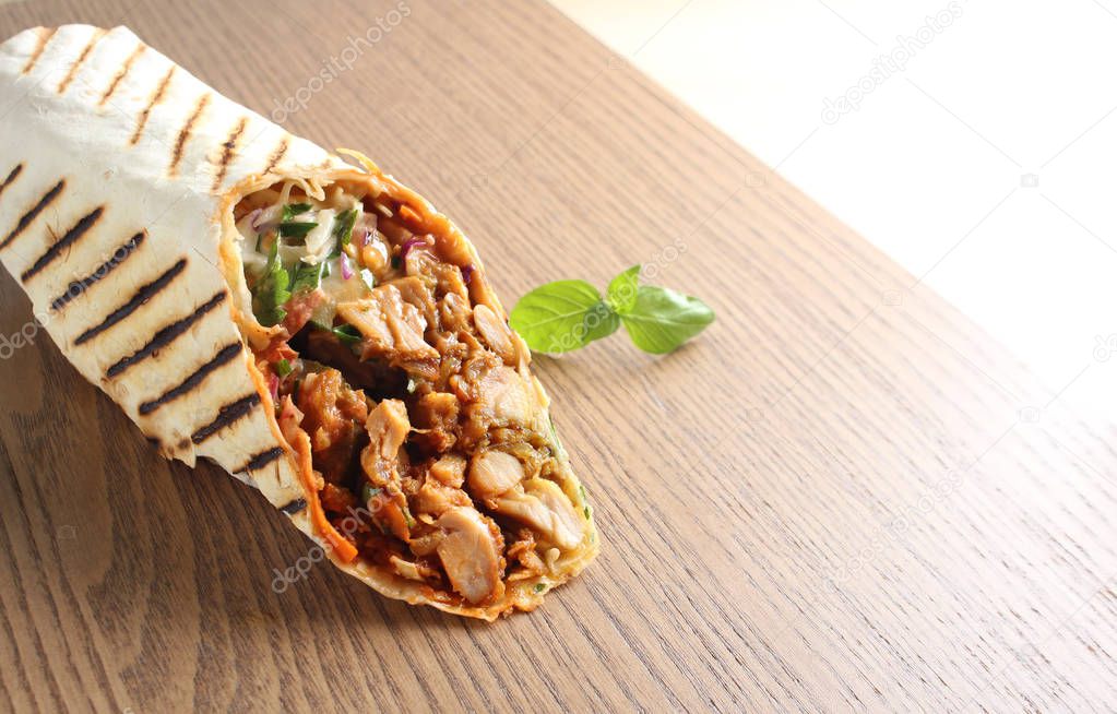 shaurma kebab on a wooden background