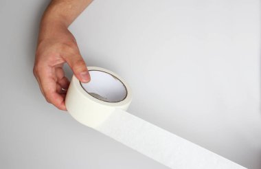 El ve gri arka plan üzerinde bant