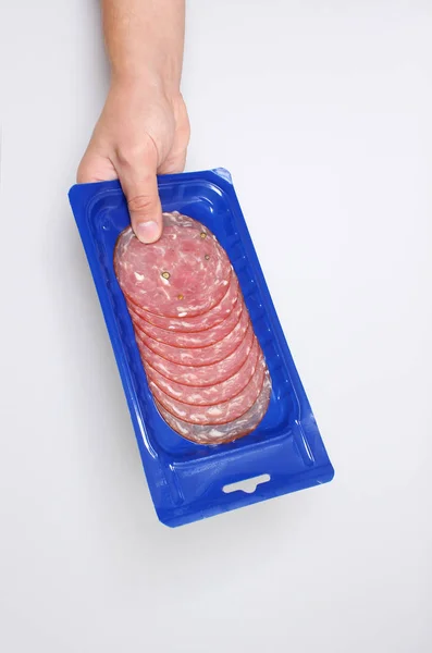 Blue Vacuum Packing Sausage Cut Hold Hand — Stock Photo, Image