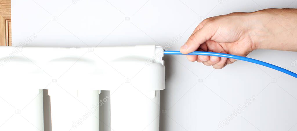 setting water filter hand flask on light background